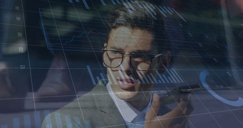 Business Professional Analyzing Financial Data Interfaces - Download Free Stock Images Pikwizard.com