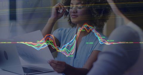 Diverse Professionals Analyzing Financial Data Overlay