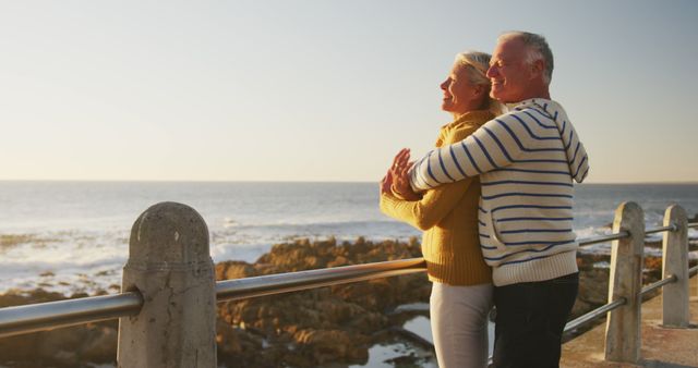 Happy Senior Couple Embracing by Seaside at Sunset - Download Free Stock Images Pikwizard.com