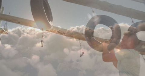 Athlete navigating tire challenge on outdoor obstacle course