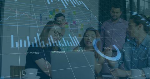 Diverse business team collaborates on financial data analysis