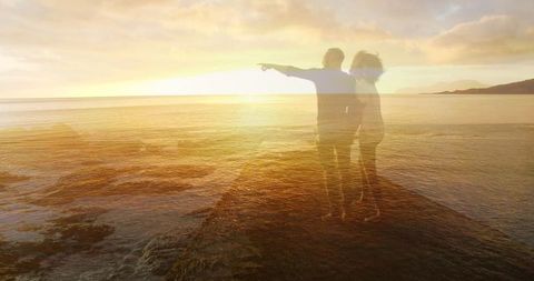 Ethereal Romantic Encounter at Sunset by Ocean - Download Free Stock Images Pikwizard.com