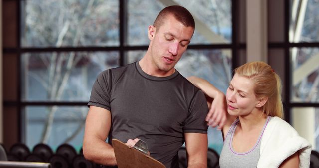 Fitness Trainer Giving Exercise Guidance to Woman - Download Free Stock Images Pikwizard.com