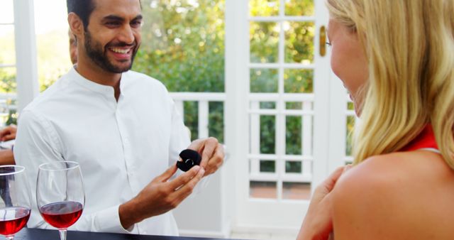 Man Proposing to Excited Woman with Engagement Ring - Download Free Stock Images Pikwizard.com