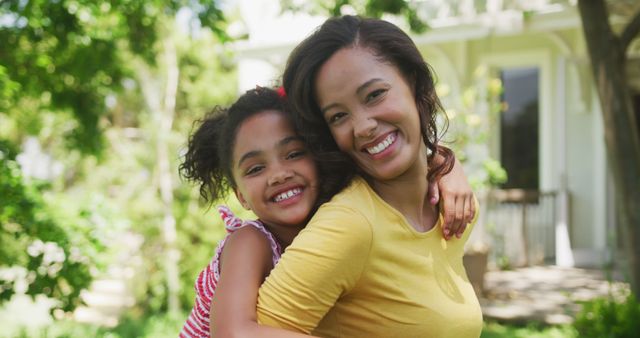 Smiling African American mother and daughter outdoors bonding - Download Free Stock Images Pikwizard.com