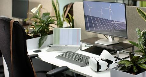 Eco-Friendly Workspace with VR and Renewable Energy Display