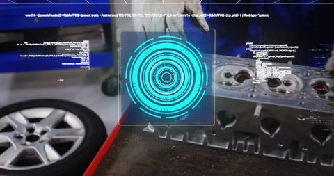 Mechanic inspecting cylinder head with holographic diagnostic overlay in automotive workshop