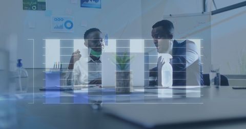 Diverse Colleagues Analyzing Financial Data During Pandemic - Download Free Stock Images Pikwizard.com