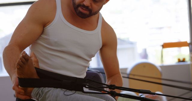 Personal Trainer Assisting Man with Rehabilitation Exercises - Download Free Stock Images Pikwizard.com