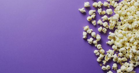 Delicious Popcorn on Vibrant Purple Background - Download Free Stock Images Pikwizard.com