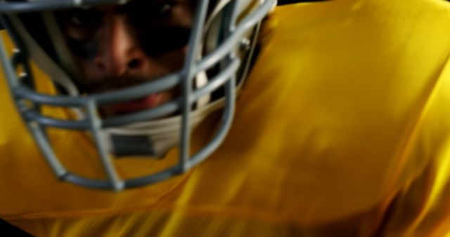 Close Up of Football Player in Yellow Jersey During Game Action - Download Free Stock Images Pikwizard.com