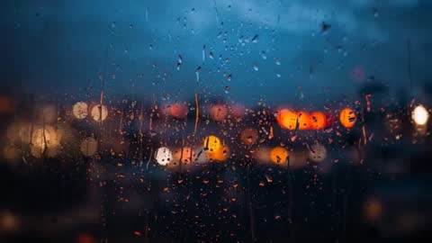 Rain Sliding Down Window at Dusk with City Bokeh Lights and Moody Evening Glow