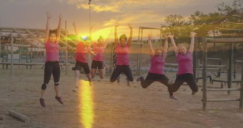 Energetic Women Conquering Obstacle Course at Sunset - Download Free Stock Images Pikwizard.com