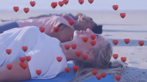 Women Relaxing on Beach with Heart Animation