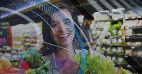 Smiling shopper holding fresh produce with sweeping digital overlay showcasing groceries