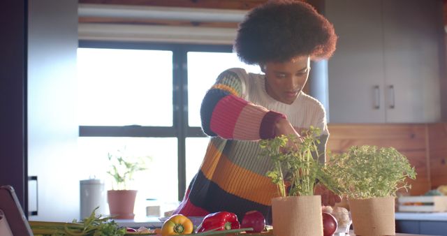 Young Woman Preparing Fresh Vegetable Meal in Bright Kitchen - Download Free Stock Images Pikwizard.com