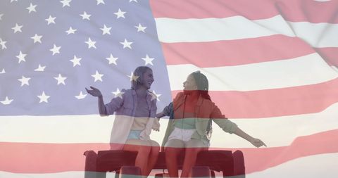 Flag of USA Overlaying Joyful Women on Beach Road Trip