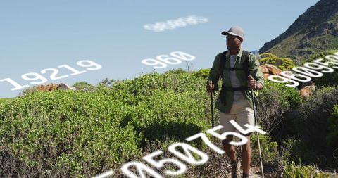 Adventurous hiker exploring mountain trail