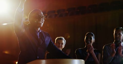 Smiling Businessman Receiving Applause from Colleagues - Download Free Stock Images Pikwizard.com