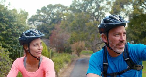 Couple Enjoying Cycling Through Scenic Forest Path - Download Free Stock Images Pikwizard.com