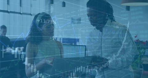 Team Analyzing Financial Data with Chart Overlay in Modern Office