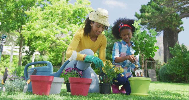 Mother and Daughter Gardening Outdoors on Sunny Day - Download Free Stock Images Pikwizard.com