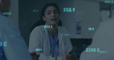 Doctor leading medical meeting with digital currency influences