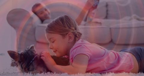 Child Relaxing with Pet While Mother Reads on Sofa in Cozy Living Room