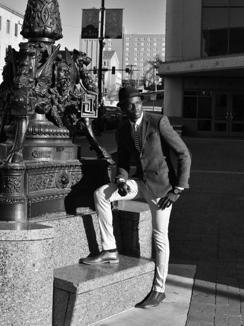 Stylish Man Posing on Urban Street with Historical Monument - Download Free Stock Images Pikwizard.com