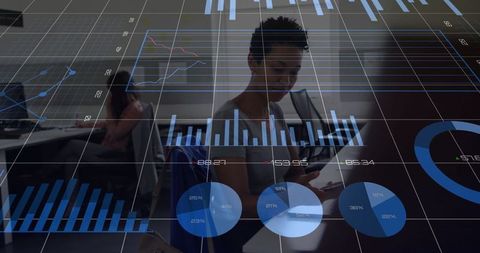 Data analyst interacting with digital charts in modern office