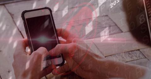 Hands holding smartphone with ar interface and holographic elements