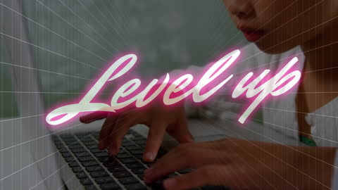Leveling Up: Asian Girl Typing on Computer Keyboard