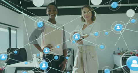 Two Businesswomen with Digital Network Overlay in Modern Office