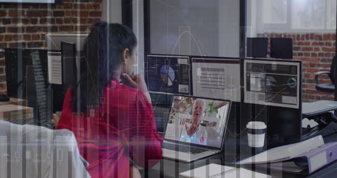 Businesswoman in Video Call with Graphs and COVID-19 Precautions