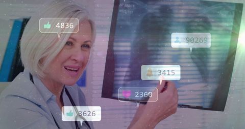 Healthcare Professional Displaying Engagement with Digital Metrics - Download Free Stock Images Pikwizard.com