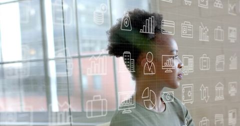 Focused African American Businesswoman with Digital Interface Overlay