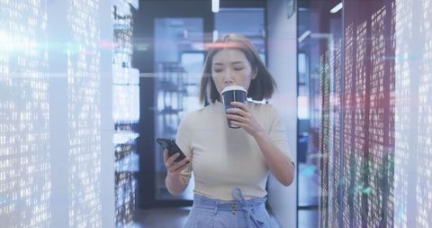 Modern Businesswoman Using Smartphone with Digital Overlay