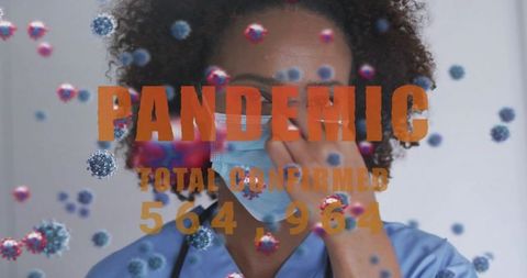 Frontline nurse adjusting mask wearing blue scrubs and stethoscope pandemic data overlay