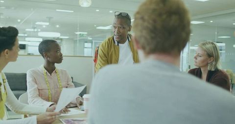 Diverse Business Team Engaged in Creative Meeting