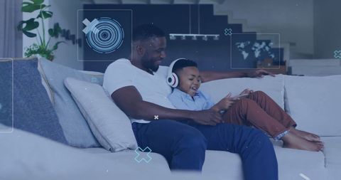 father and son bonding time with digital interface overlay - Download Free Stock Images Pikwizard.com