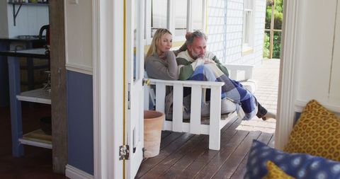 Senior Couple Relaxing on Coastal Terrace with View - Download Free Stock Images Pikwizard.com