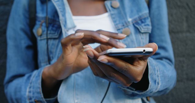 Person Using Smartphone Outdoor With Focused Hands - Download Free Stock Images Pikwizard.com