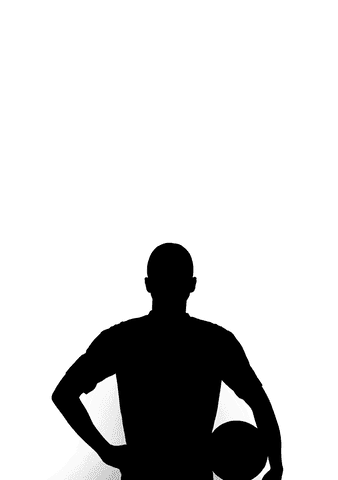 Silhouetted sportsman holding ball on transparent background