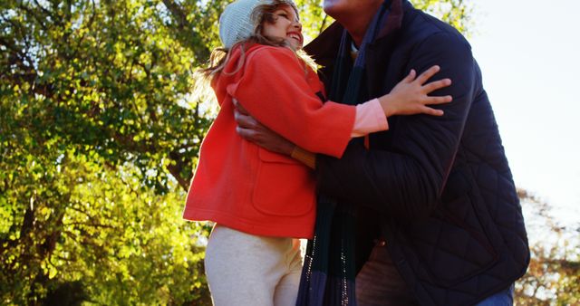 Father Embracing Daughter Outdoors in Autumn - Download Free Stock Images Pikwizard.com