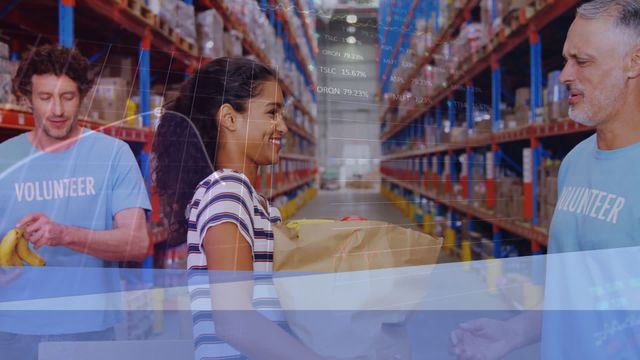 Volunteers of diverse backgrounds engage in sorting tasks in a busy warehouse, captured with an overlay of data graphics representing efficiency and coordination through technology. The image conveys themes of teamwork, diversity, and the integration of digital resources in community efforts. Ideal for illustrating modern charitable endeavors, non-profit marketing materials, or web designs incorporating humanitarian or logistical concepts.