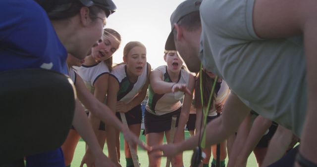 Field Hockey Team in a Huddle with Coach Discussing Strategy - Download Free Stock Images Pikwizard.com