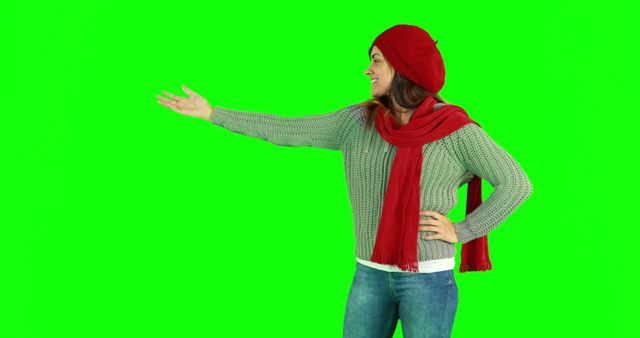 Woman in Winter Clothes Gesturing on Green Screen Background - Download Free Stock Images Pikwizard.com