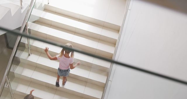 Children Walking Up Stairs Indoors from Above View - Download Free Stock Images Pikwizard.com