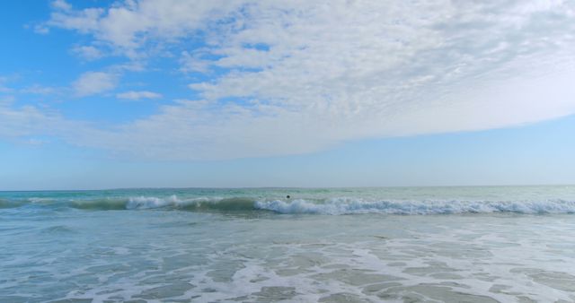 Serene Blue Ocean Waves Under Hazy Sky - Download Free Stock Images Pikwizard.com