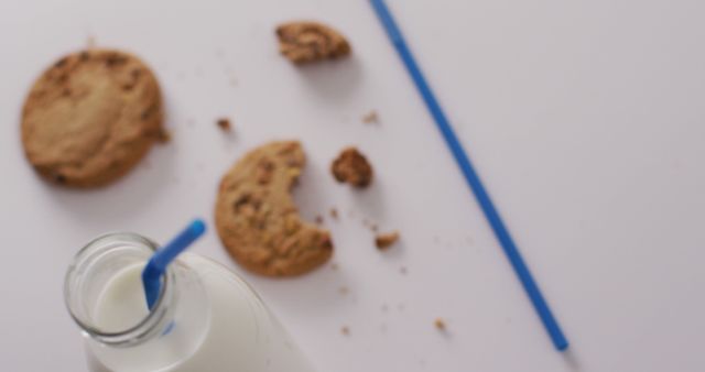 Fresh Milk and Cookies with Blue Straw on White Background - Download Free Stock Images Pikwizard.com